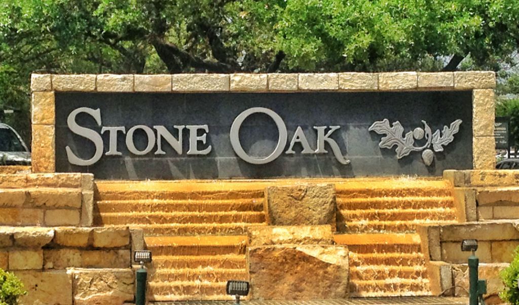 A Waterfall with the Stone Oak Letters on it